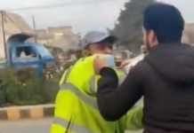 Young boy fighting with police.