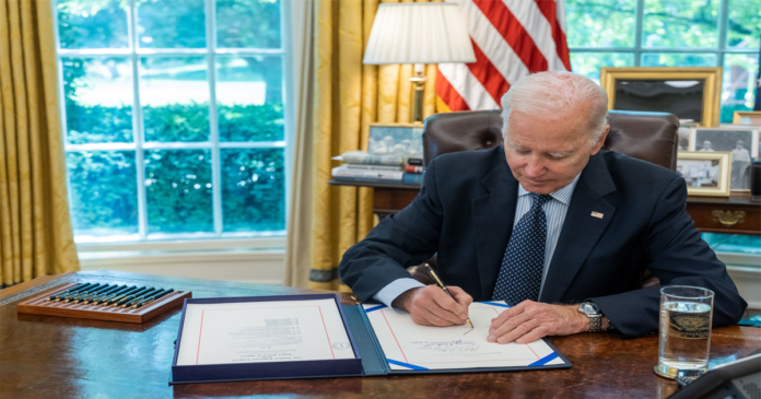 Biden signs debt limit bill avoiding US default