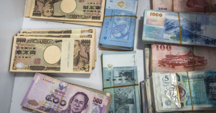 Most Asian currencies slip