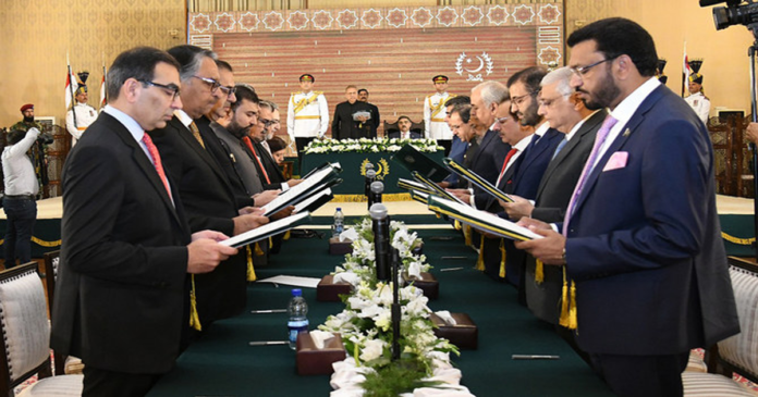 President administers oath to caretaker cabinet