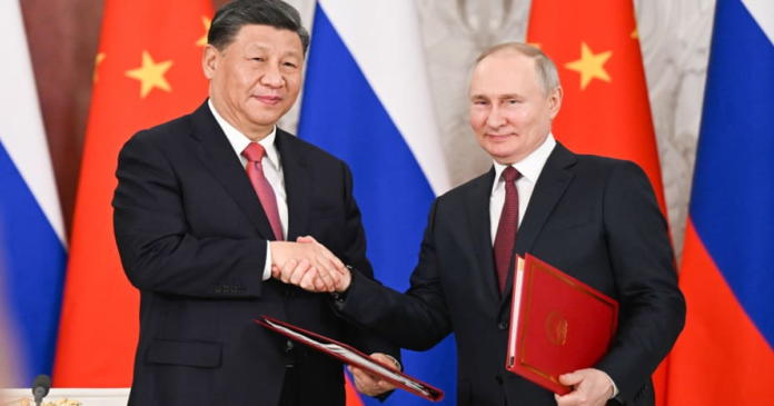 Putin visit China in October